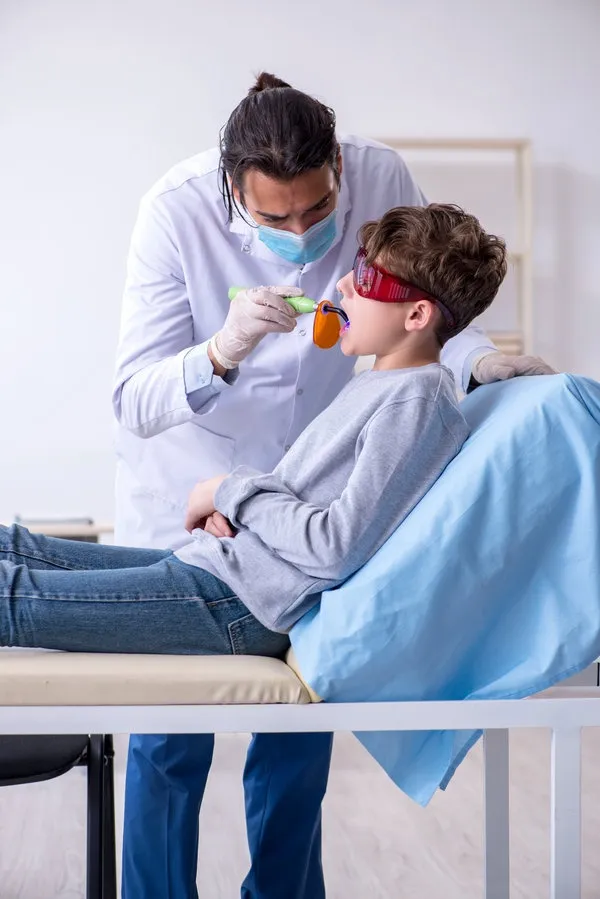 Young boy visiting doctor in hospital The young boy visiting doctor in hospital